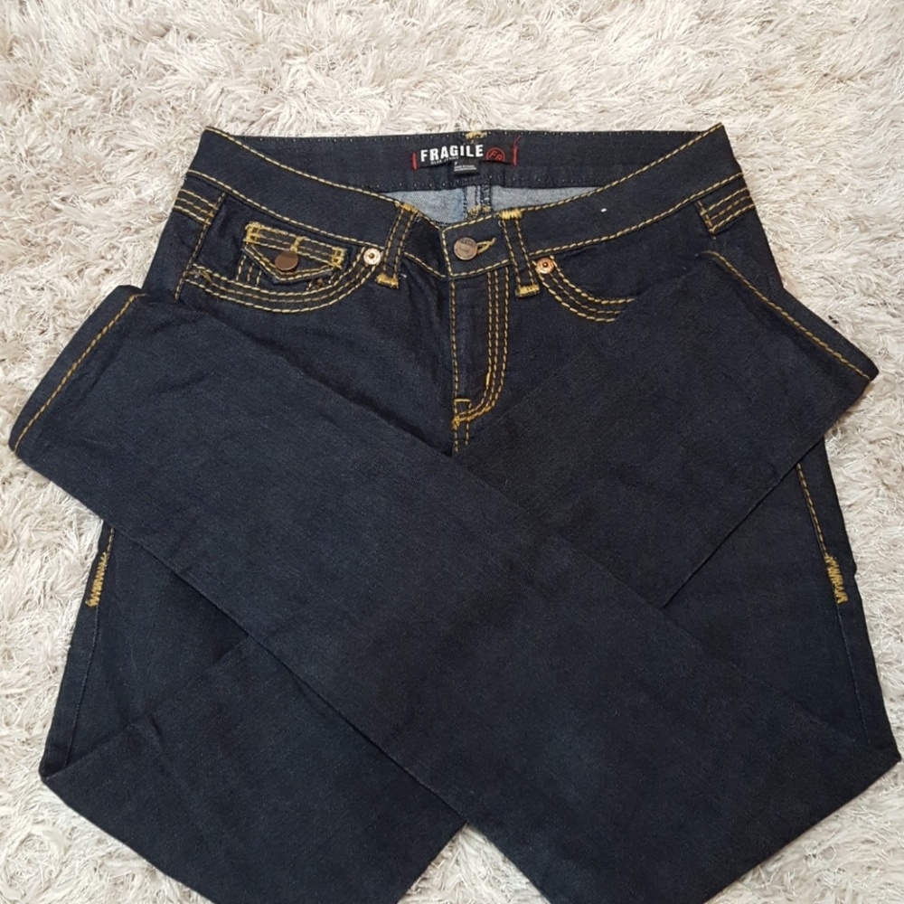 Fragile skinny jeans